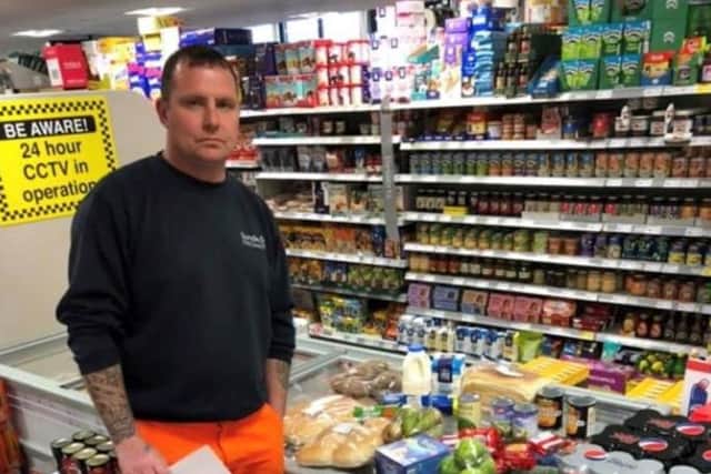 Tom McManus with the food parcel that was donated by Bob Singh from Nisa Local, Barmston, Washington.