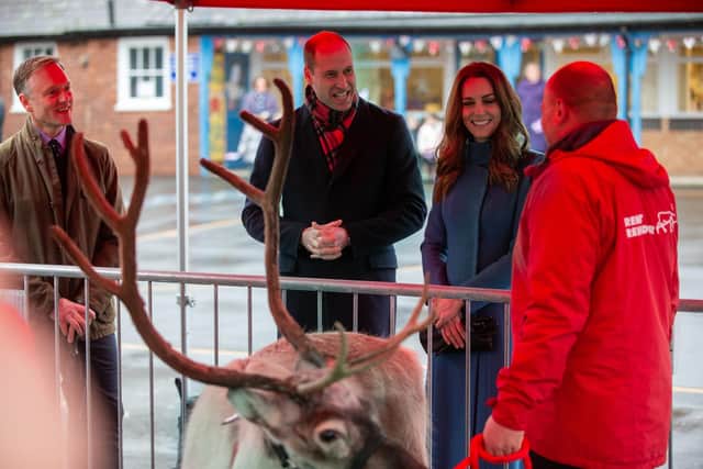 The Duke and Duchess of Cambridge meet staff and pupils - and reindeers - during a visit to Holy Trinity Church of England First School in Berwick-upon-Tweed on the second day of a three-day tour across the country. Photo by PA.