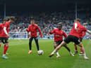 Sunderland players warming up. PA picture.