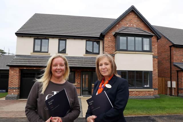 Maxine Kane, right with resident Linzi Potts, who bought a  home from her at the Burdon Rise development.