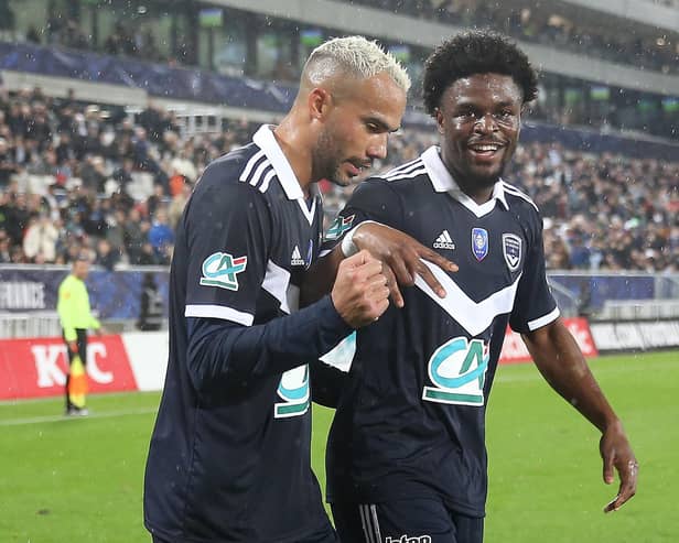 Bordeaux English forward Josh Maja celebrates with Bordeaux Brazilian midfielder Fransergio (L) after scoring during the French Cup round of 64 football match between FC Girondins de Bordeaux and Stade Rennais FC at the Matmut Atlantique Stadium in Bordeaux, southwestern France, on January 7, 2023. (Photo by ROMAIN PERROCHEAU / AFP) (Photo by ROMAIN PERROCHEAU/AFP via Getty Images)