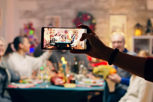 Family photos make great memories, but it is important to remember the dangers when sharing on social media. Photo posed by models