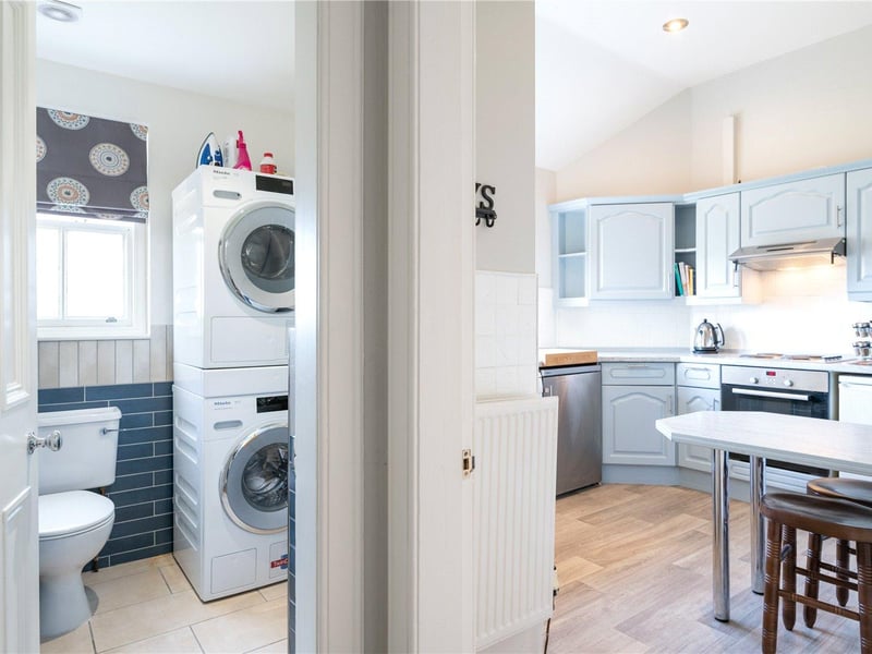 Utility room and kitchen.