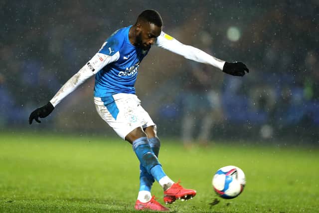 PETERBOROUGH, ENGLAND - DECEMBER 08:  Mo Eisa of Peterborough United takes a shot during the EFL Trophy match between Peterborough United and West Ham United Under 21 at Weston Homes Stadium on December 08, 2020 in Peterborough, England. (Photo by David Rogers/Getty Images)