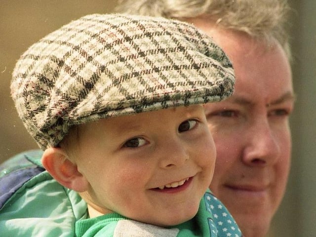 Plenty of smiles from this youngster on a big day in 1993.
