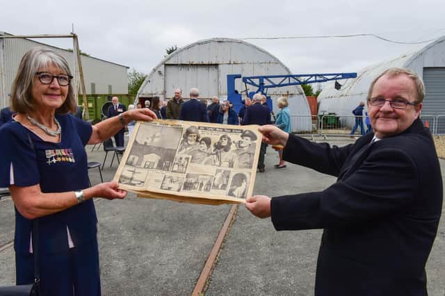 Museum Chairman David Charles with  Rosemary Parrott, whose father flew with 607 Squadron in 1940, with a copy of the Daily Sketch dated March 4th 1940 which featured the Squadron, then serving in France.