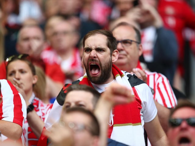 Fans of Sunderland celebrate during the League One play-off final match between Charlton Athletic and Sunderland at Wembley Stadium on May 26, 2019.