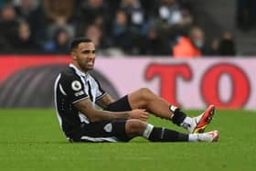 Callum Wilson of Newcastle United reacts with an injury during the Premier League match between Newcastle United  and  Manchester United at St James' Park on December 27, 2021 in Newcastle upon Tyne, England. (Photo by Stu Forster/Getty Images)
