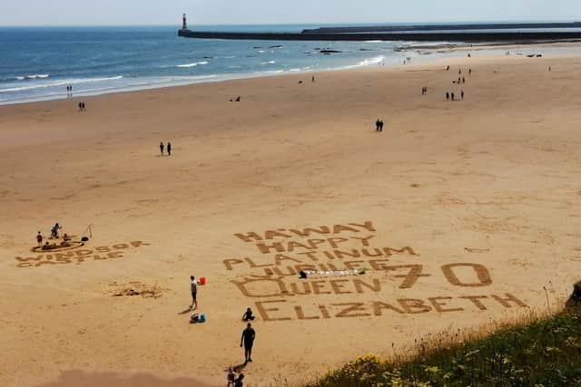 A Jubilee message in the sand as the four-day bank holiday gets underway. Picture: John Alderson.