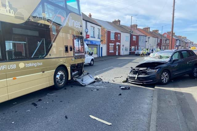 Collision between bus and car in Easington Lane
