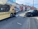 Collision between bus and car in Easington Lane