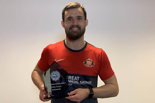 Sunderland AFC defender Bailey Wright with his PFA Community Champion Award.