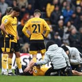 Diego Costa was stretchered off against Tottenham Hotspur during Wolves' last Premier League match (Photo by DARREN STAPLES/AFP via Getty Images)