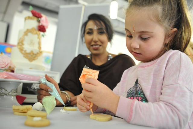 Jasmine Race decorating a biscuit with Little Elephant Cake Company's Veera Kaur at Sunderland's Diwali Festival. Remember this from 5 years ago?