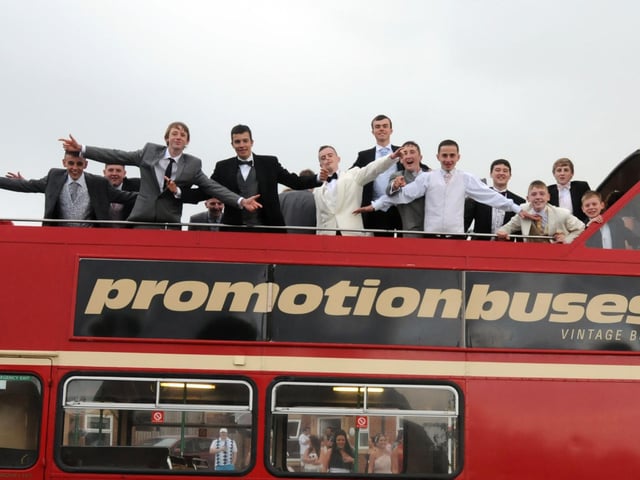 Pupils from Thornhill school prepare for the journey to their prom at the Stadium of Light in an open-topped bus, in 2011.