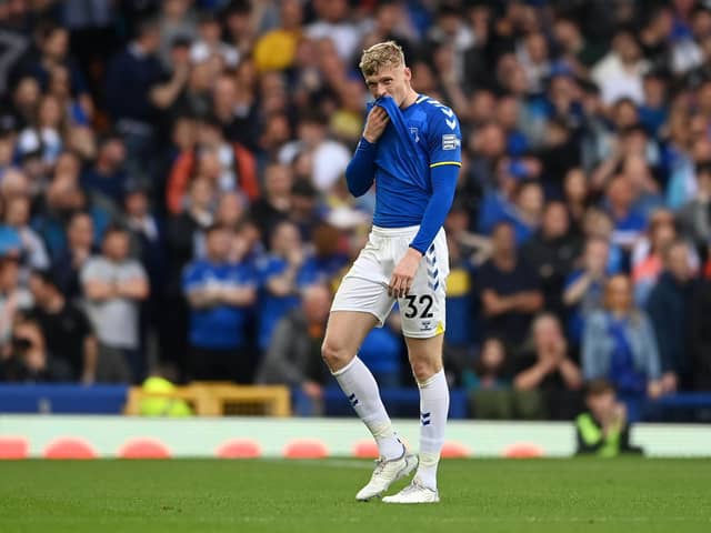 LIVERPOOL, ENGLAND - MAY 15: Jarrad Branthwaite of Everton leaves the field after receiving a red card from Referee Michael Oliver during the Premier League match between Everton and Brentford at Goodison Park on May 15, 2022 in Liverpool, England. (Photo by Gareth Copley/Getty Images)