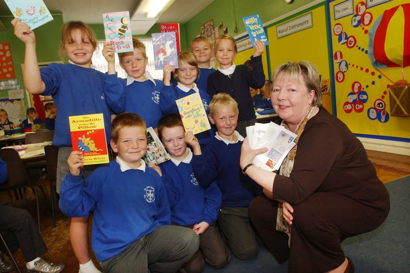 Pupils at St John Bosco RC Primary School were given book vouchers to celebrate National Poetry Day in 2004.