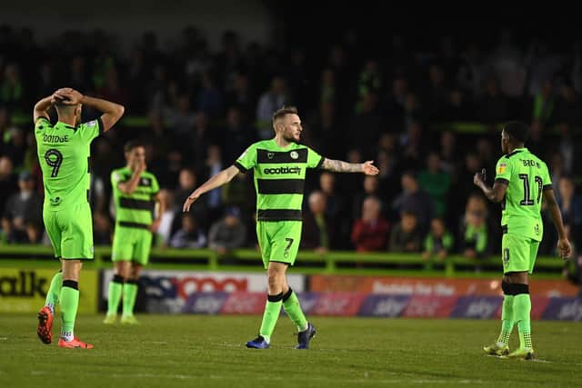NAILSWORTH, ENGLAND - MAY 13: Carl Winchester of Forest Green Rovers (C) reacts after being sent off during the Sky Bet League Two Play-off Semi Final Second Leg match between Forest Green and Tranmere Rovers at The New Lawn on May 13, 2019 in Nailsworth, United Kingdom. (Photo by Harry Trump/Getty Images)