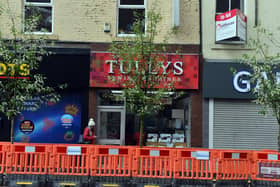 Tully's are unhappy that the trees are obscuring their premises.