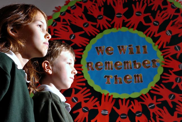 Emma Waterworth, 10, and Joseph Walley, nine, at Grindon Broadway Junior School where a giant poppy was created from the hand prints of nearly 60 pupils in 2010.