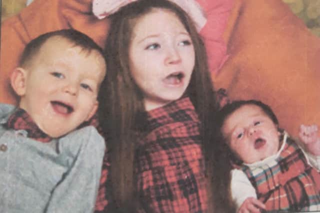 Paige (middle) with her brother Brody and sister Summer.