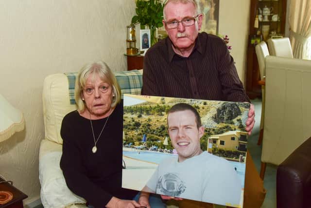 Dan and Linda Golden, of Chapel Garth, Sunderland, with a photograph of their late son, Frazer Golden, who died after a 2017 collision while out on his motorbike in the Durham Dales.