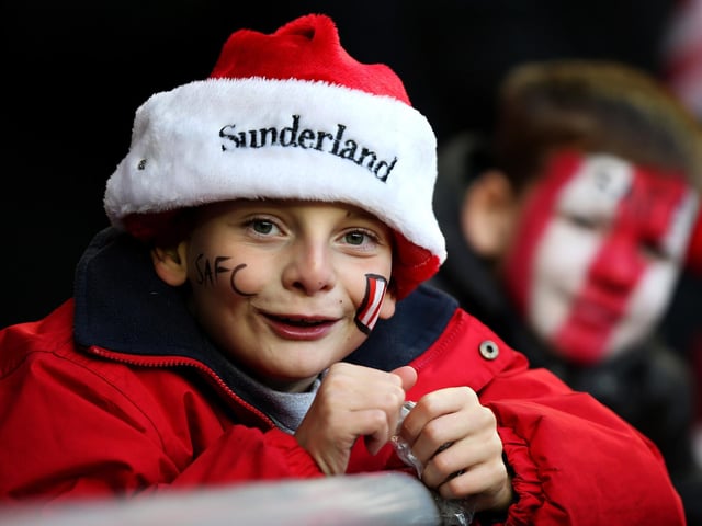 A young Sunderland fan enjoys the atmosphere prior to the Premier League match between Sunderland and Norwich City at the Stadium of Light on December 21, 2013.