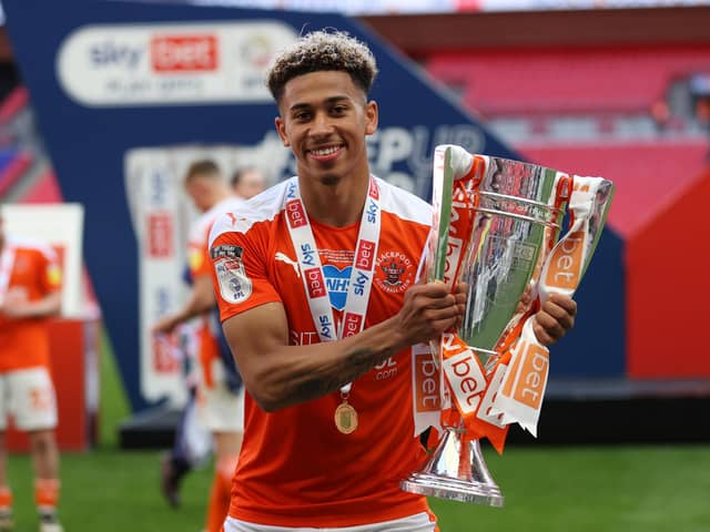 LONDON, ENGLAND - MAY 30: Jordan Lawrence-Gabriel of Blackpool poses with the trophy after the Sky Bet League One Play-off Final match between Blackpool and Lincoln City at Wembley Stadium on May 30, 2021 in London, England. A limited number of fans will be allowed into the stadium as Coronavirus restrictions begin to ease in the UK following the COVID-19 pandemic. (Photo by Catherine Ivill/Getty Images)