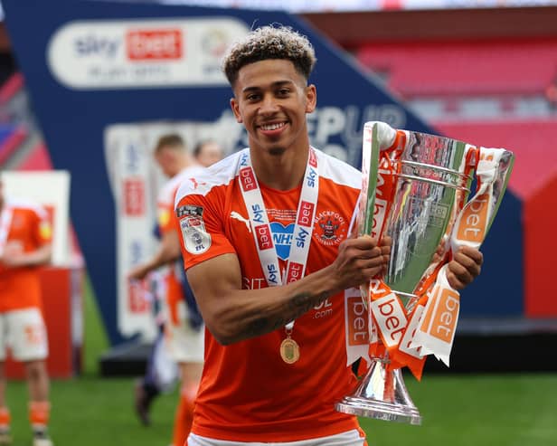 LONDON, ENGLAND - MAY 30: Jordan Lawrence-Gabriel of Blackpool poses with the trophy after the Sky Bet League One Play-off Final match between Blackpool and Lincoln City at Wembley Stadium on May 30, 2021 in London, England. A limited number of fans will be allowed into the stadium as Coronavirus restrictions begin to ease in the UK following the COVID-19 pandemic. (Photo by Catherine Ivill/Getty Images)