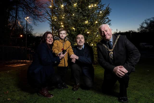 Harry Coulson, 6, with parents Joanne Johnson and Mike Coulson alongside Cllr Watts Stelling.