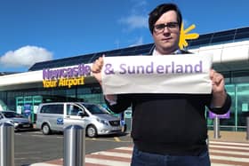 Councillor Paul Edgeworth outside Newcastle Airport.