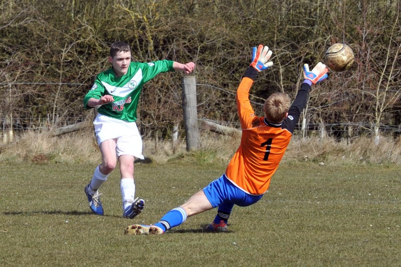 An Ashfield FC player takes a shot during the Under 14's Division One match against DFS Welbeck Welfare.