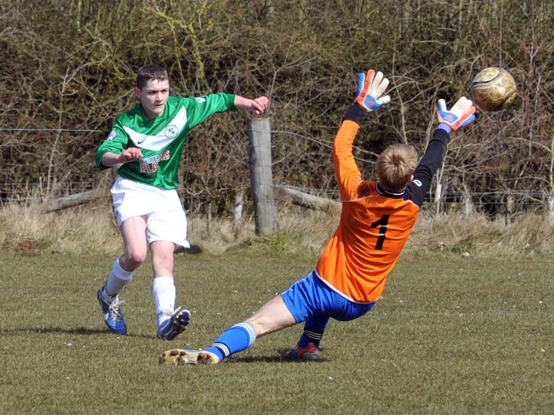 An Ashfield FC player takes a shot during the Under 14's Division One match against DFS Welbeck Welfare.