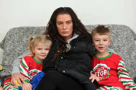 Gentoo tenant Shannon Eastick, 28, with her children Carson, seven and Caliana, four. Shannon has moved to live with her parents after a problem with rodents in her own house.