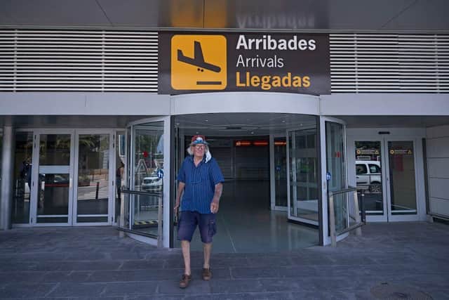 A tourist from leaves Ibiza Airport. (Photo by Andres Iglesias/Getty Images)