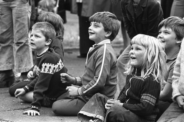 These children look enthralled by the show in September 1976.