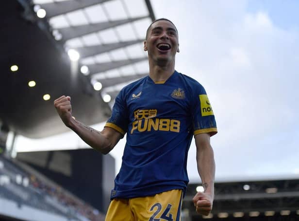 Miguel Almiron of Newcastle United celebrates after scoring their sides fourth goal during the Premier League match between Fulham FC and Newcastle United at Craven Cottage on October 01, 2022 in London, England. (Photo by Tom Dulat/Getty Images)