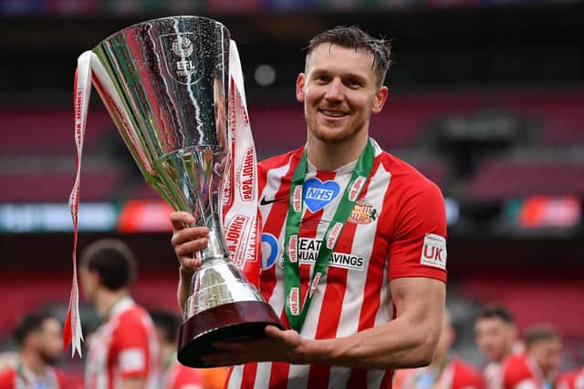 Sunderland's Charlie Wyke celebrates with the cup after the Papa John's Trophy final.
