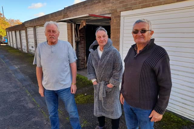 Gentoo residents, from left, John Stephenson, Graham Flynn and Bob Hall are among the Gentoo residents who are angry that the garages are to be demolished.
