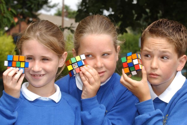 Rubik's Cube has been a mega craze for decades and here are St Mary's RC Primary School pupils Isabelle Jackson, Rebecca Smith and Thomas Harrison with theirs in 2005.