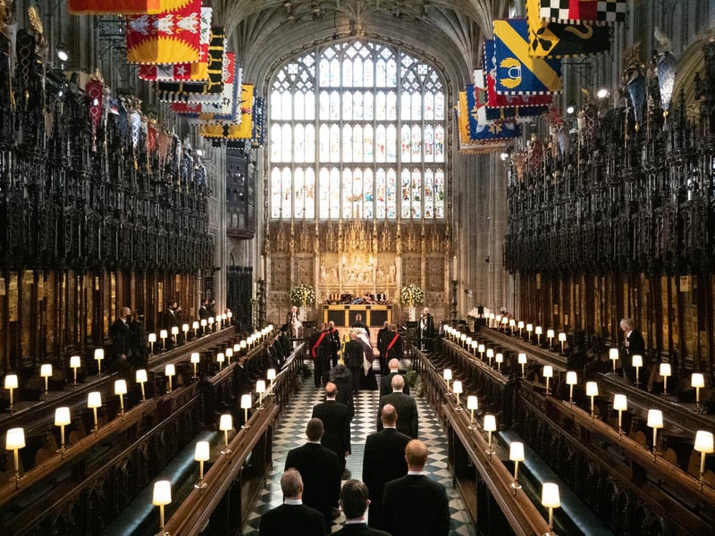 Members of the Royal family, the Princess Royal, the Prince of Wales, the Earl of Wessex, the Duke of York, Peter Phillips, the Duke of Cambridge, the Earl of Snowdon, the Duke of Sussex and Vice Admiral Sir Tim Laurence, follow as the coffin of the Duke of Edinburgh is carried into The Quire during his funeral service at St George's Chapel, Windsor Castle.