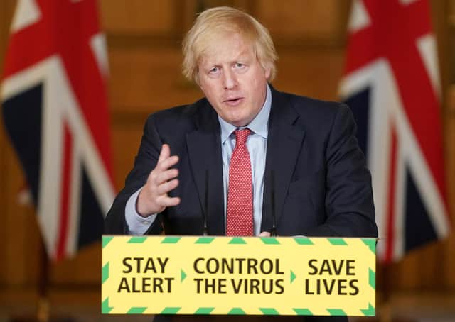 Handout photo issued by 10 Downing Street of Prime Minister Boris Johnson, during a media briefing in Downing Street.