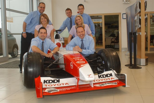 A Formula 1 car in the Newcastle Road showroom of Minories in 2005.