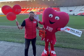 Red Sky Foundation founder Sergio Petrucci with new mascot Miss Beats at the Stadium of Light