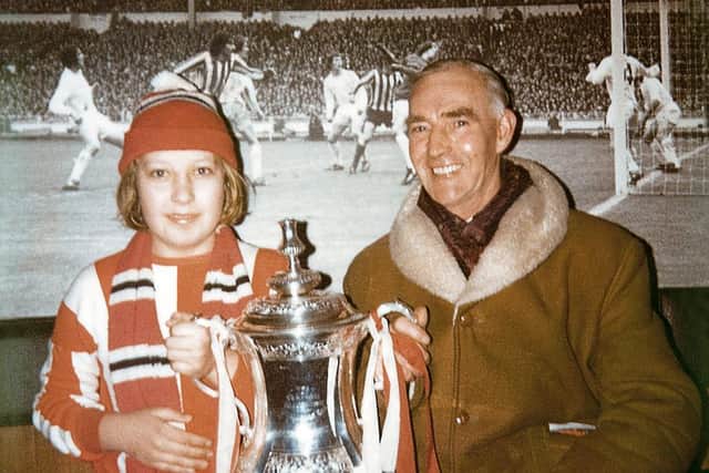 Michael and his dad with the FA Cup in 1974.