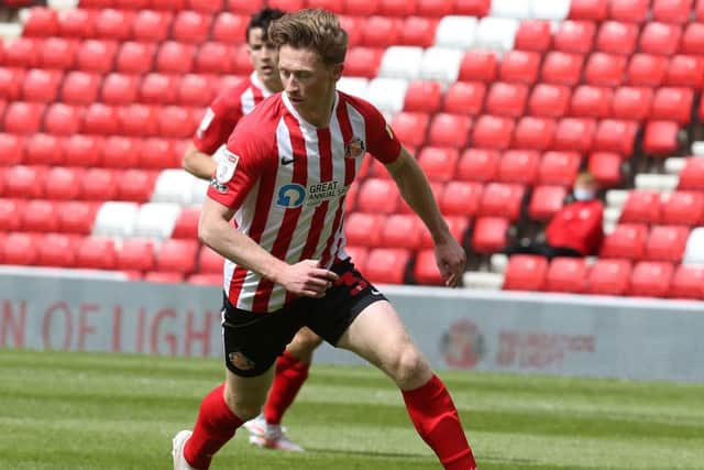 Denver Hume of Sunderland in action during the Sky Bet League One match between Sunderland and Northampton Town at Stadium of Light on May 09, 2021 in Sunderland, England. (Photo by Pete Norton/Getty Images)