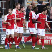 Michael Smith of Rotherham United celebrates with teammates after scoring against Bolton.