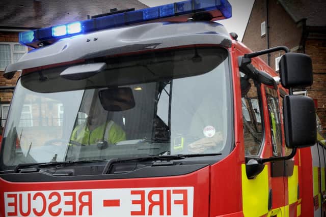 Firefighters were called to rescue a teenage boy stuck down a reservoir.
