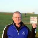 Whitburn Golf Club treasurer Ian McConnell with the Christmas card from golfing legend Peter Alliss.