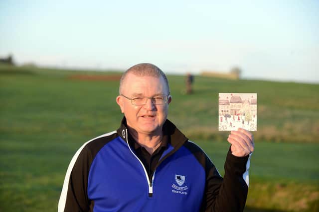 Whitburn Golf Club treasurer Ian McConnell with the Christmas card from golfing legend Peter Alliss.
